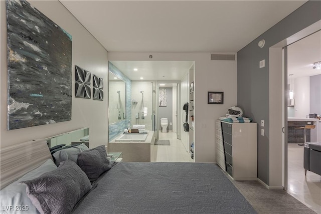 tiled bedroom with ensuite bathroom