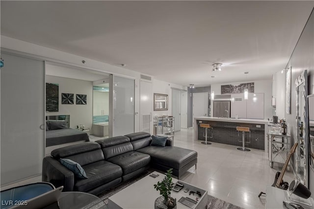 living room featuring sink