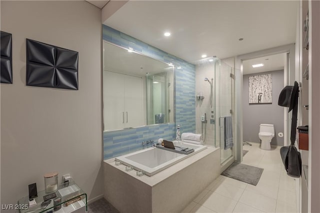 bathroom featuring vanity, toilet, an enclosed shower, and tile patterned flooring