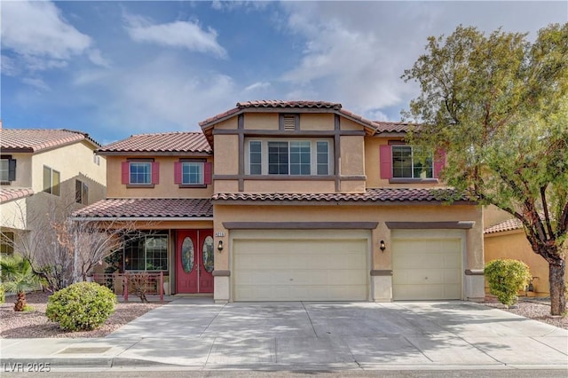 mediterranean / spanish-style house featuring a garage