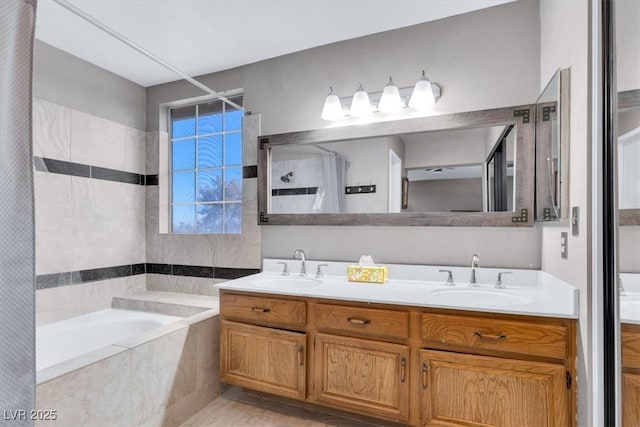 bathroom featuring vanity and separate shower and tub