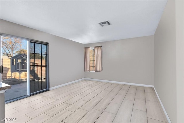 empty room with light wood-type flooring