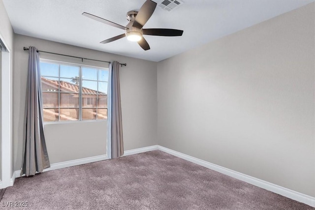 carpeted empty room with ceiling fan