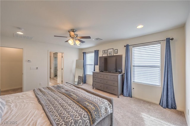 carpeted bedroom featuring visible vents, recessed lighting, baseboards, and a ceiling fan