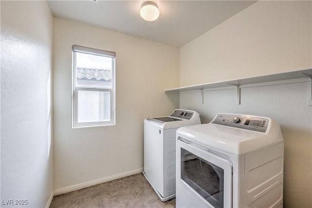 laundry room featuring light carpet, laundry area, washing machine and dryer, and baseboards