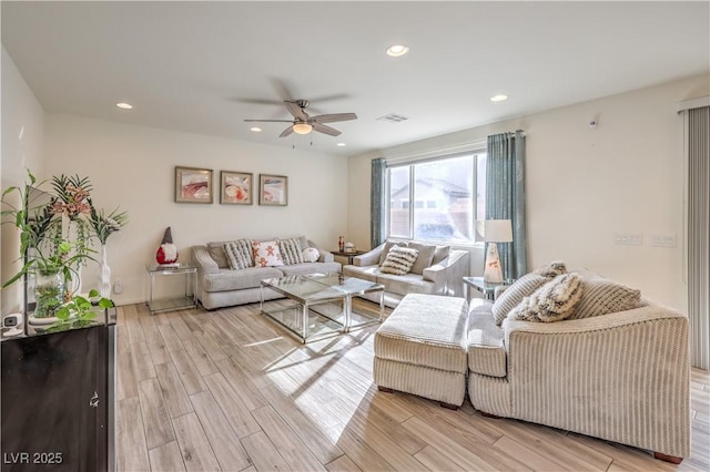 living room featuring recessed lighting, visible vents, light wood finished floors, and ceiling fan