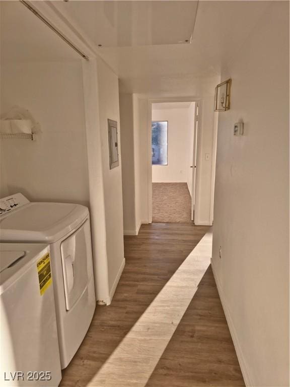 washroom featuring dark hardwood / wood-style flooring and independent washer and dryer