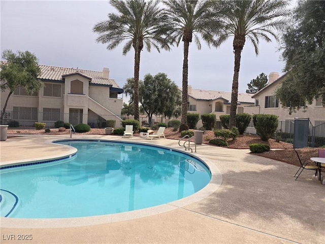 view of pool featuring a patio area