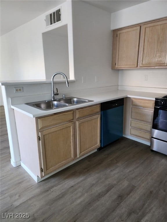 kitchen featuring sink, dishwasher, range, dark hardwood / wood-style flooring, and light brown cabinets