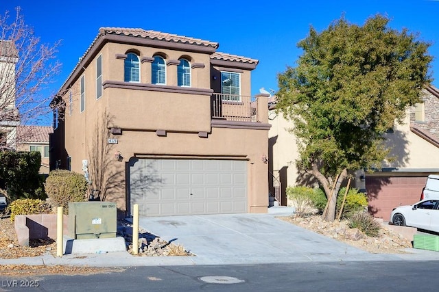 view of front of house featuring a garage and a balcony