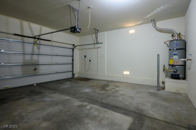 garage with water heater and a garage door opener