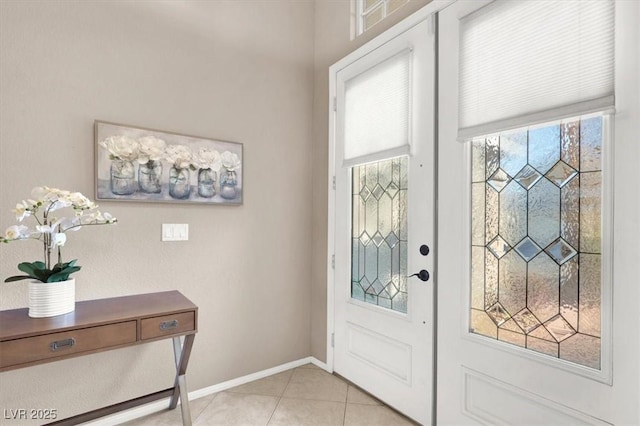 entrance foyer with light tile patterned floors