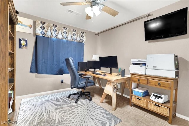 office area featuring light tile patterned flooring and ceiling fan