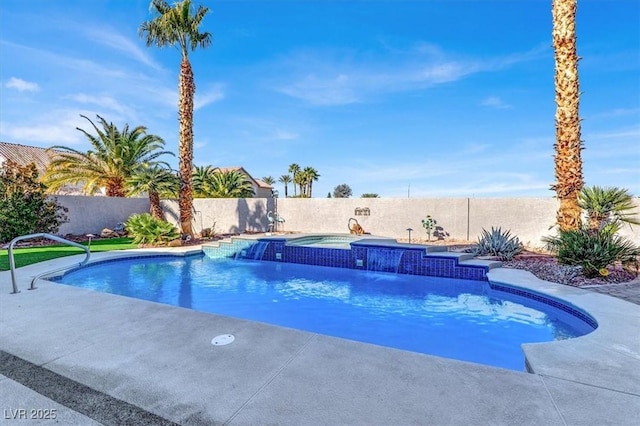 view of pool with an in ground hot tub and pool water feature