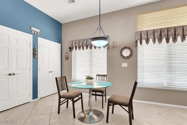 view of tiled dining space