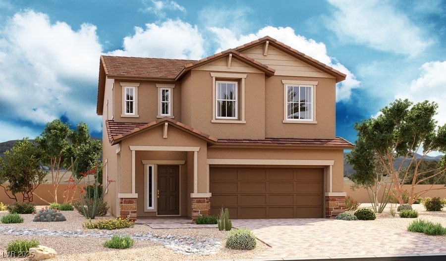 view of front of home with a garage