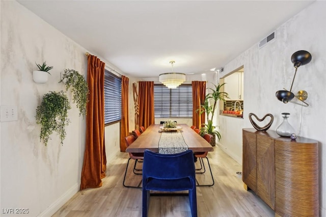 dining area featuring light hardwood / wood-style flooring