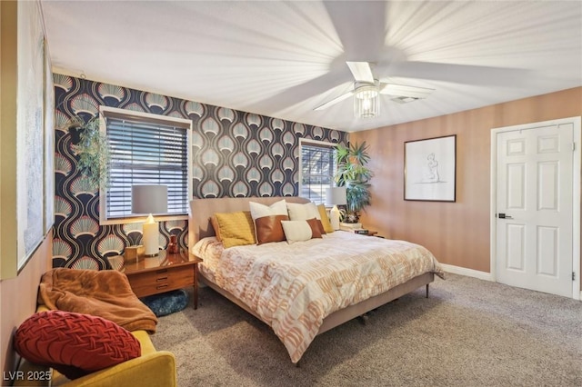 bedroom with ceiling fan and carpet flooring