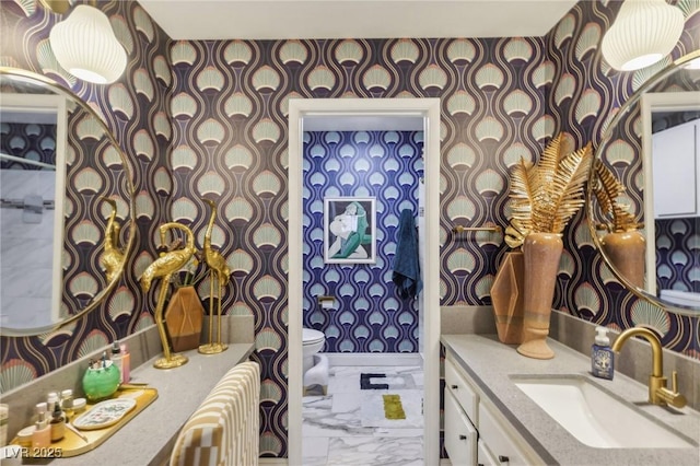 bathroom with vanity and toilet