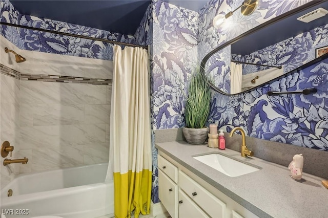 bathroom with vanity and shower / tub combo