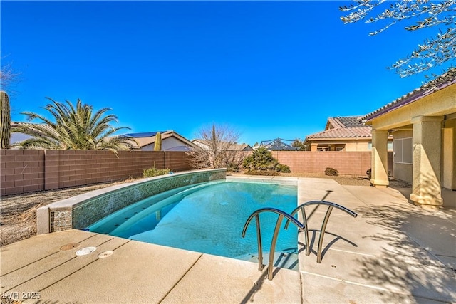 view of pool featuring a patio area