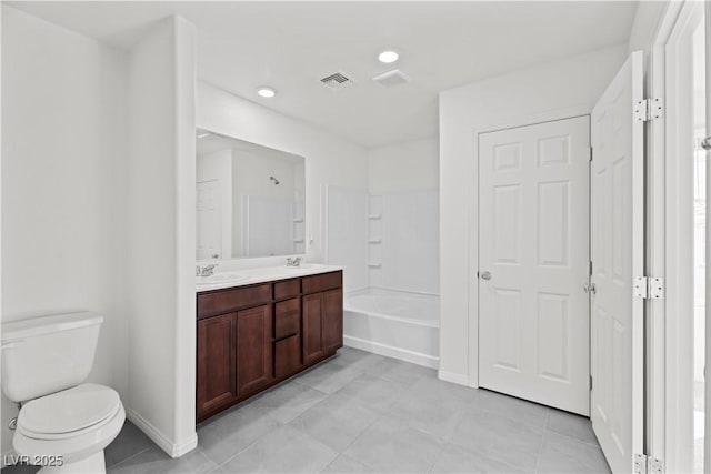 full bathroom featuring vanity, tile patterned flooring, bathing tub / shower combination, and toilet