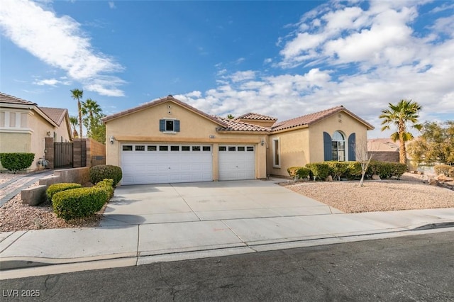 mediterranean / spanish-style house featuring a garage