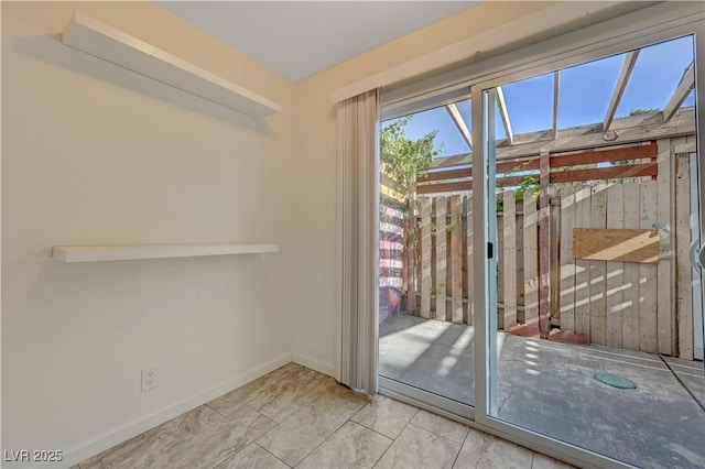 doorway with light tile patterned flooring