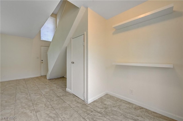 bonus room with lofted ceiling