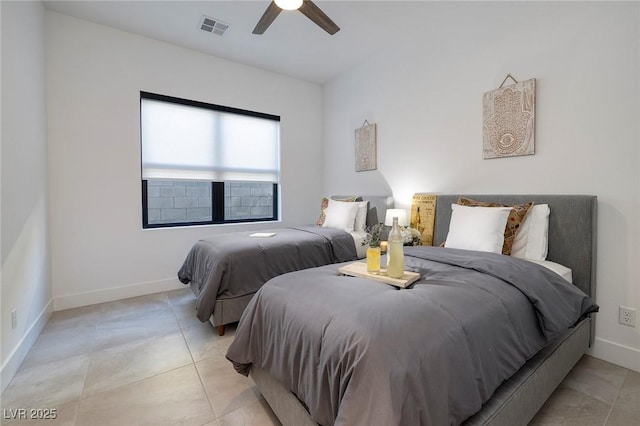 bedroom with light tile patterned floors and ceiling fan