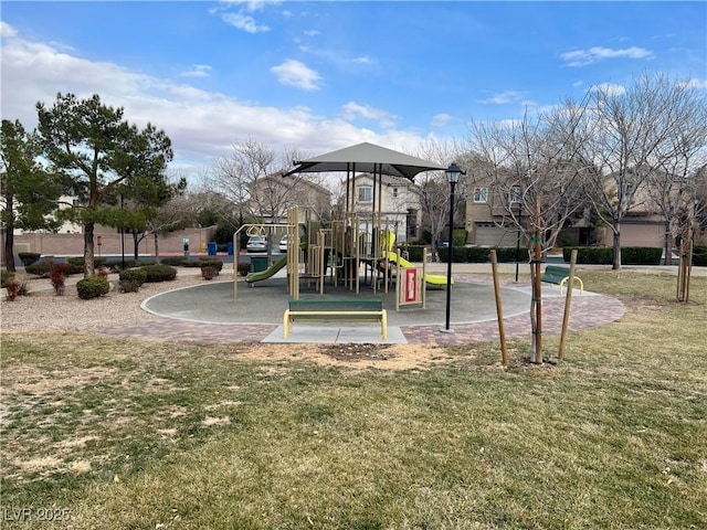 view of play area featuring a lawn