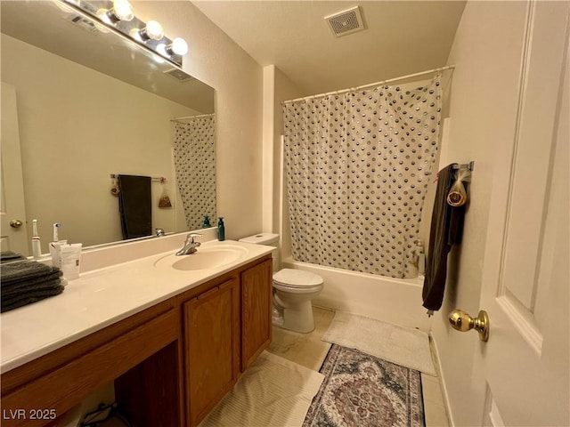 full bathroom featuring vanity, shower / bath combo, and toilet