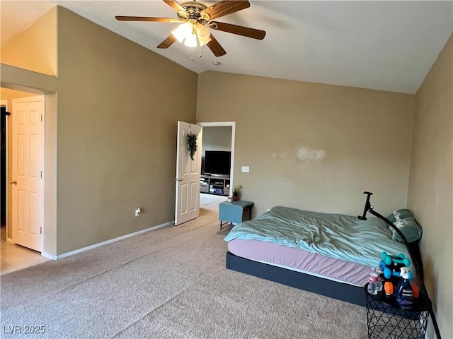 bedroom with lofted ceiling, carpet flooring, and ceiling fan