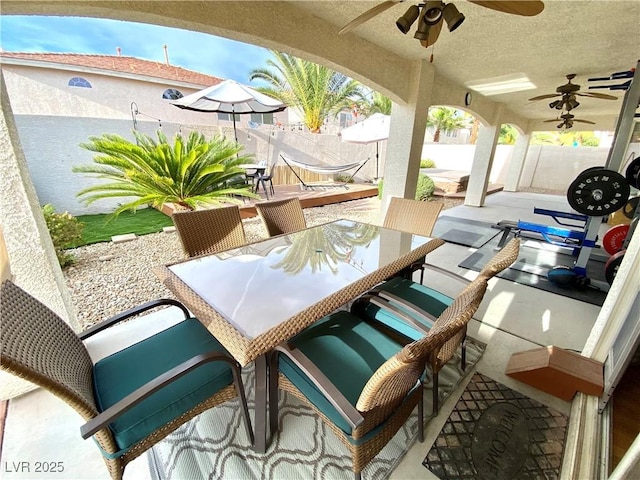 view of patio / terrace featuring ceiling fan