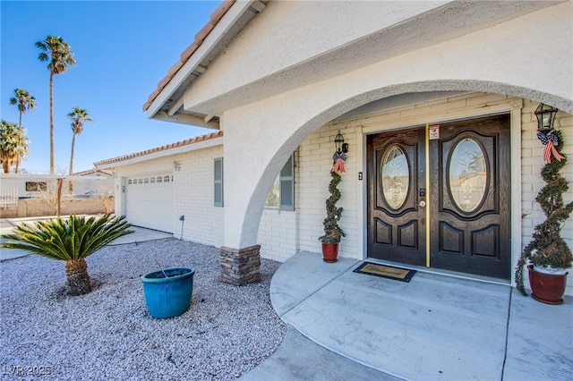 entrance to property featuring a garage