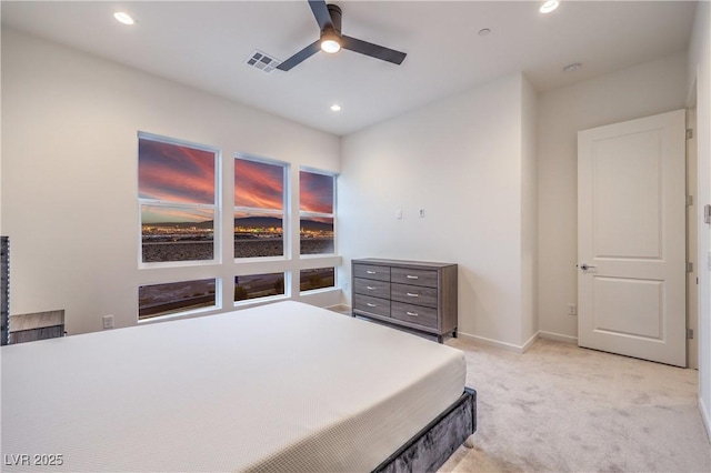 carpeted bedroom featuring ceiling fan