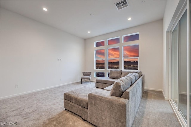 living room featuring light carpet