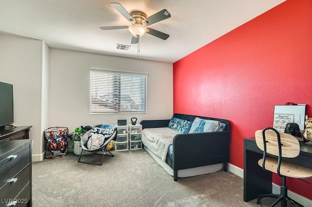 bedroom featuring ceiling fan, carpet flooring, visible vents, and baseboards