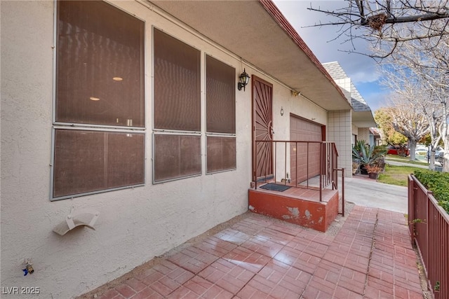 view of property exterior featuring a garage