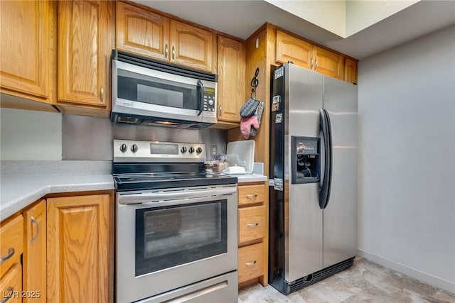 kitchen featuring appliances with stainless steel finishes