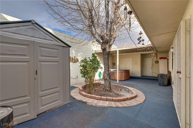 view of patio featuring a hot tub