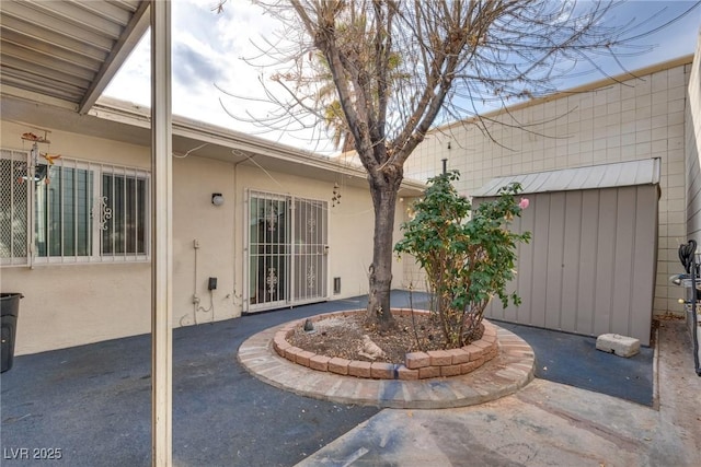 exterior space with a storage unit