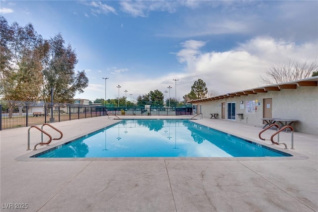 view of pool featuring a patio