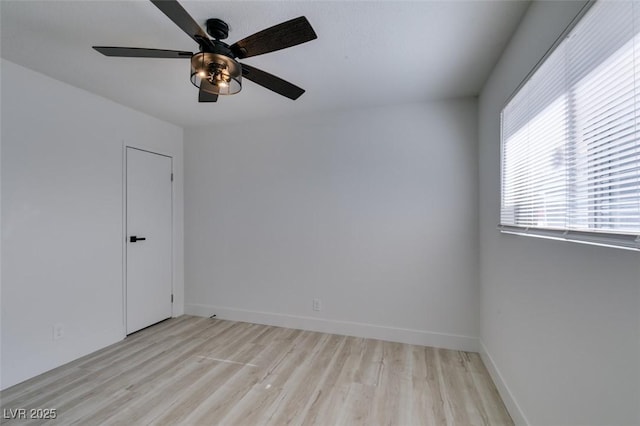 unfurnished room with ceiling fan and light hardwood / wood-style floors