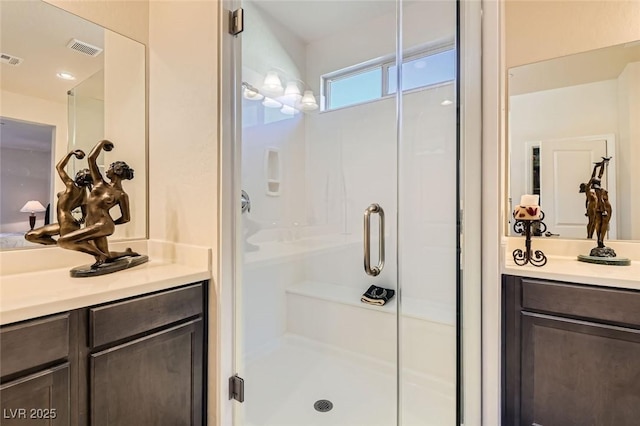 bathroom featuring vanity and walk in shower