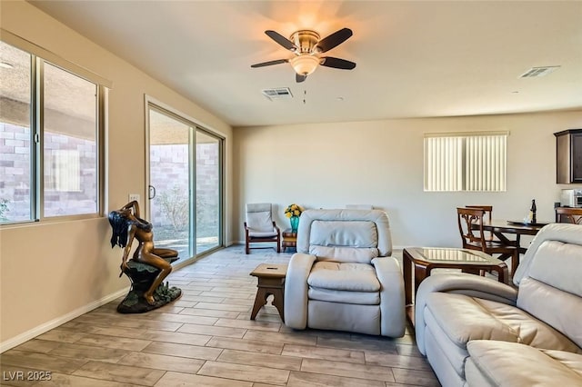 living room featuring ceiling fan