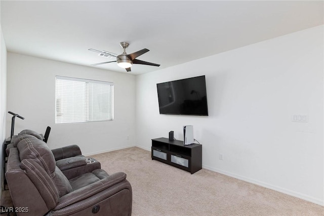 living room with ceiling fan and light carpet