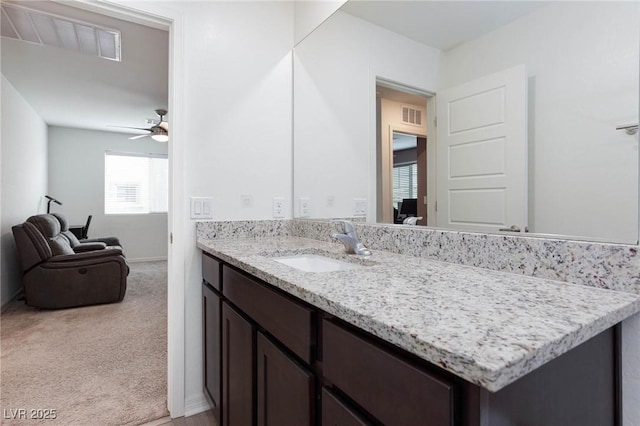 bathroom with vanity and ceiling fan