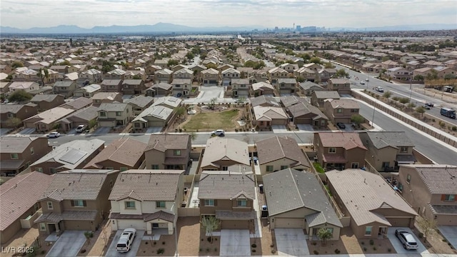 drone / aerial view featuring a mountain view