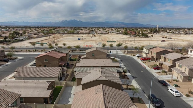 drone / aerial view featuring a mountain view